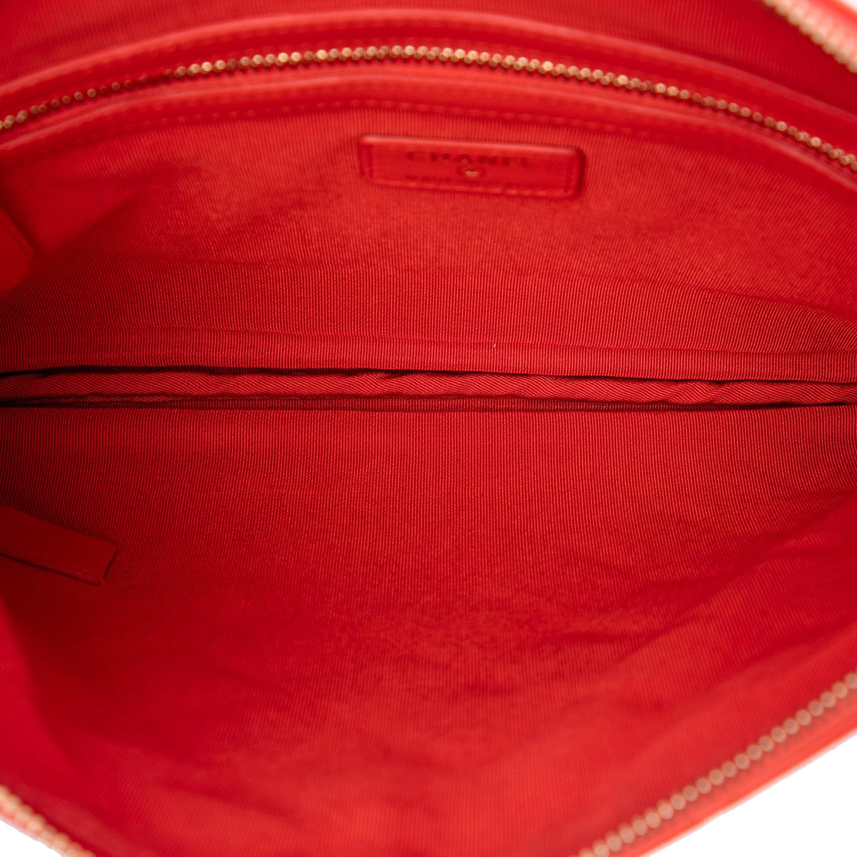 Chanel Medium Quilted Lambskin O Case Clutch