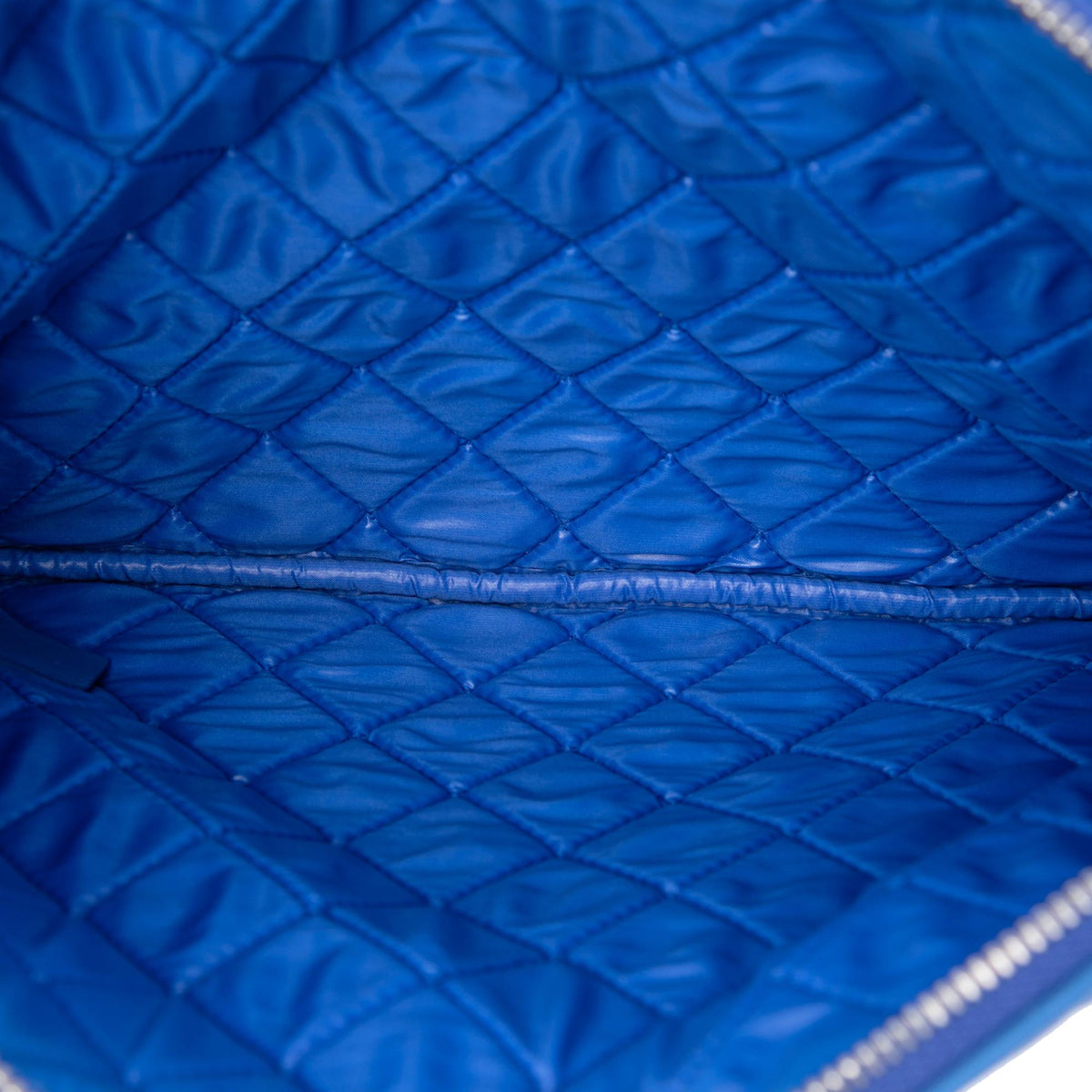 Chanel Medium Quilted Lambskin O Case Clutch