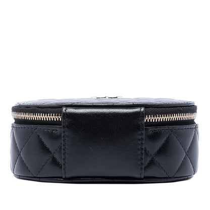 Chanel CC Quilted Lambskin Oval Top Handle Clutch