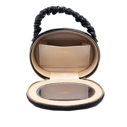 Chanel CC Quilted Lambskin Oval Top Handle Clutch