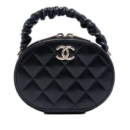 Chanel CC Quilted Lambskin Oval Top Handle Clutch
