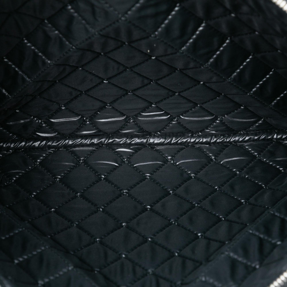 Chanel Large Quilted Patent O Case Clutch