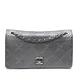 Chanel Medium Embossed Calfskin Propeller Flap