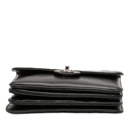 Chanel Medium Quilted Lambskin Clams Pocket Flap