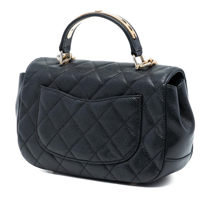 Chanel Small Quilted Caviar Carry Around Flap